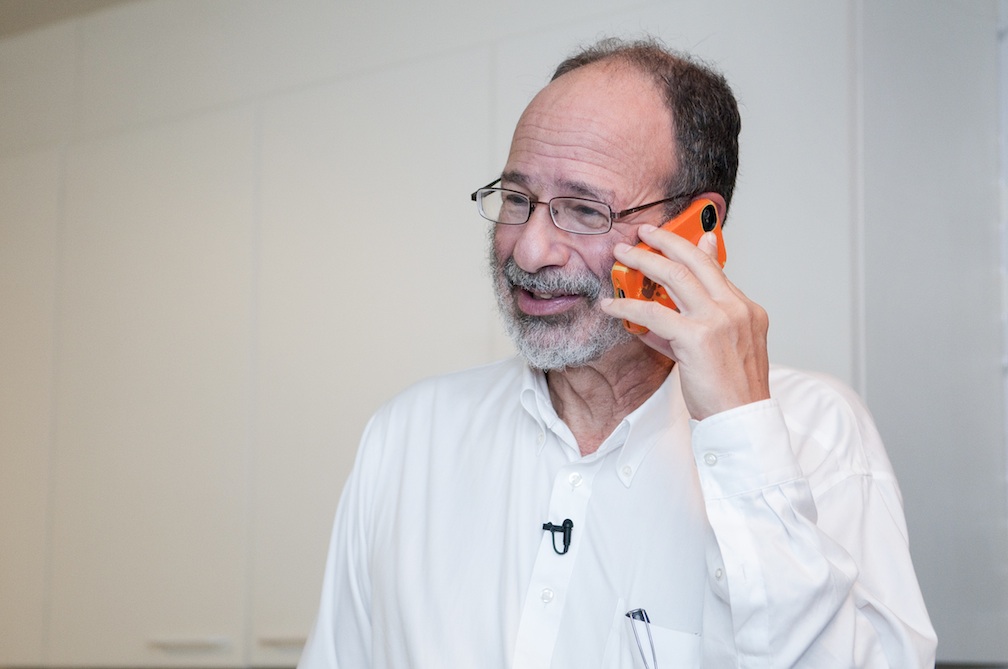 researcher Alvin Roth on phone
