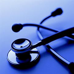 stethoscope with blue background