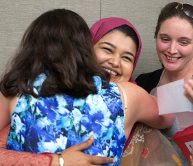 Rowza Rumma, hugs Jennifer DeCoste-Lopez, at Match Day 2015 at Stanford School of Medicine on March 20, 2015. ( Norbert von der Groeben/Stanford School of Medicine )