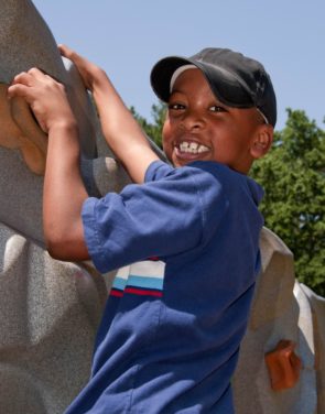 http://www.public-domain-image.com/free-images/people/children-kids/young-african-american-boy-depicted-here-was-having-a-fun-time.jpg