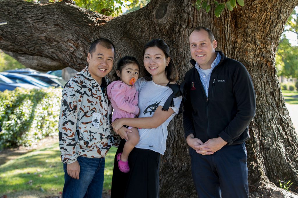 Honbun Li, Sici Tsoi, and their daughter Astrea Li, along with Dr. James Priest , MD. outside Packard Children's Hospital on Friday, September 23, 2016. ( Norbert von der Groeben/ Stanford School of Medicine )