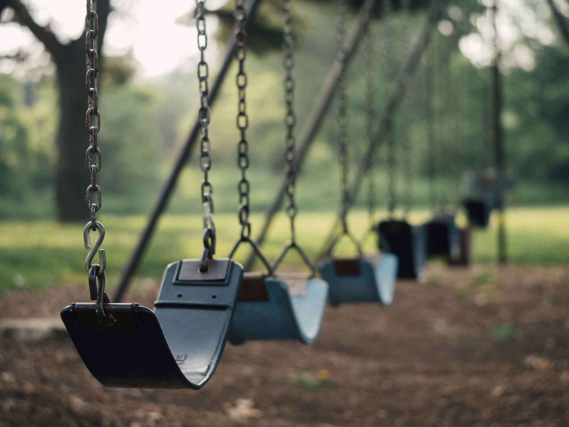empty swings in a playground