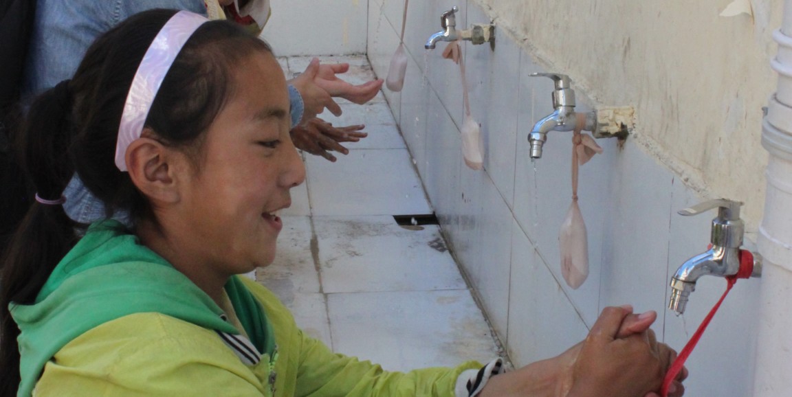 School girl in China washing hands