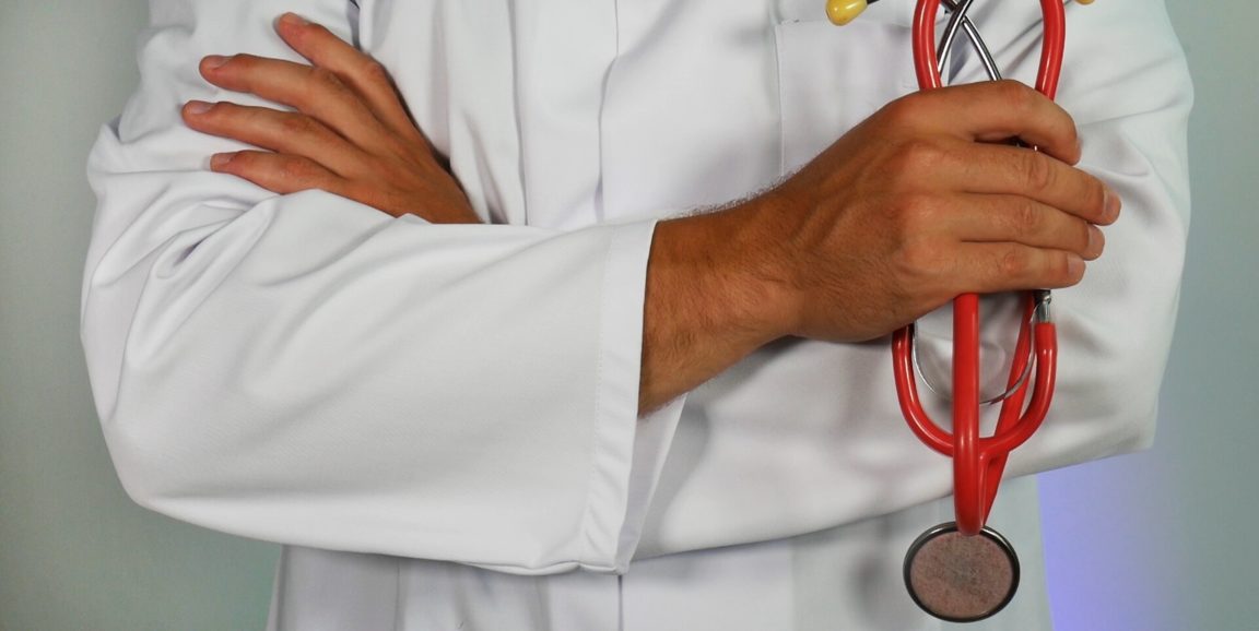 doctor holding stethoscope