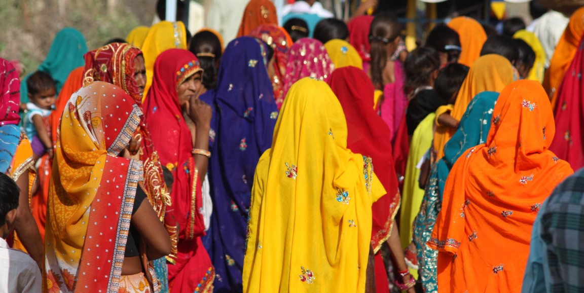 women in colorful saris in India