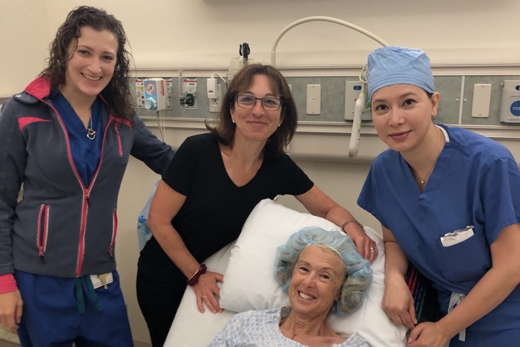 Surgeons Yulia Zak, Irene Wapnir, and Dung Nguyen visit their patient, Kathleen Wilde.