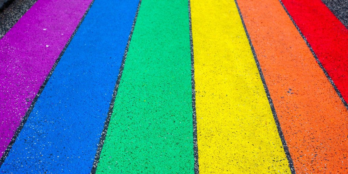 rainbow stripes on pavement