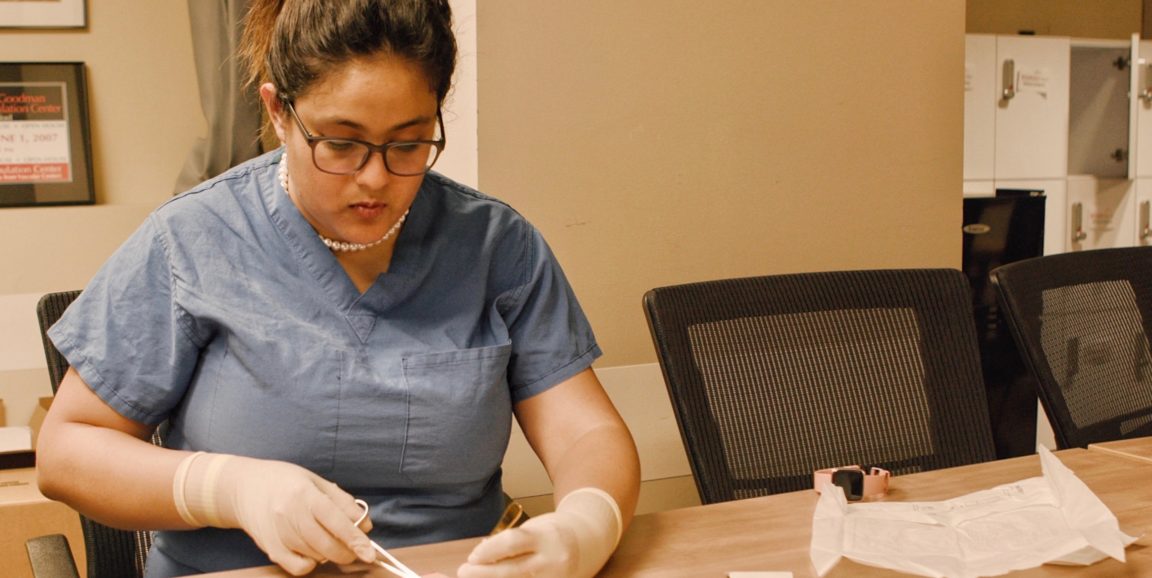 Paloma Marin-Nevarez practices sutures