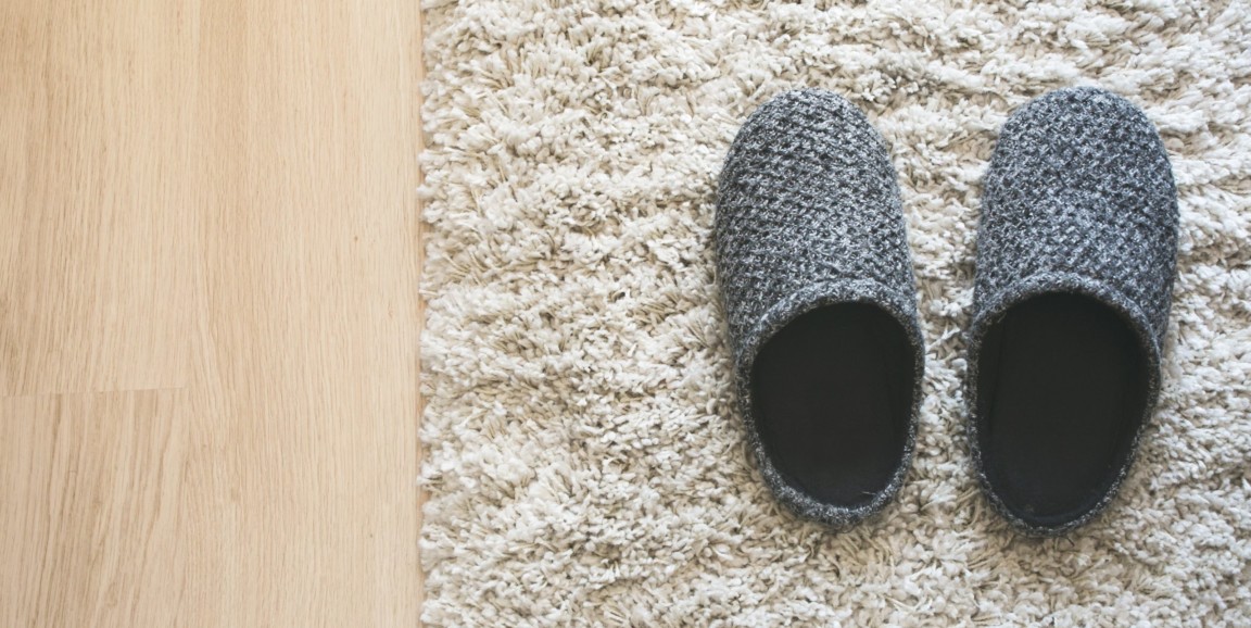 grey-slippers-on-carpet
