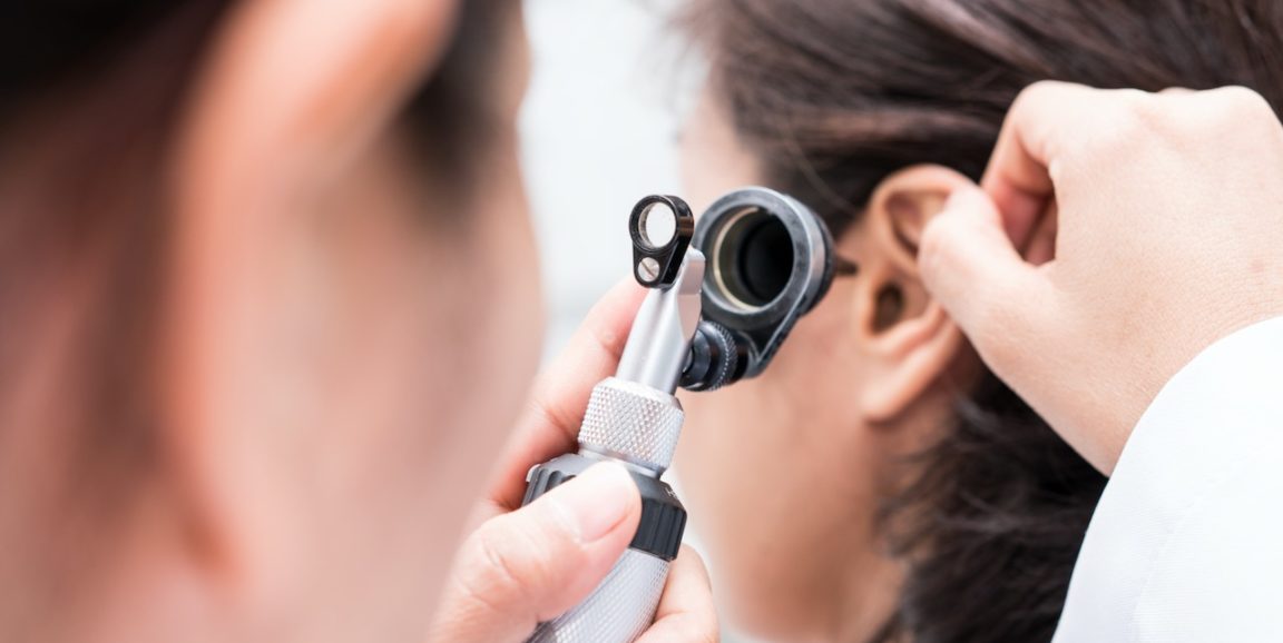 Ear exam using otoscope